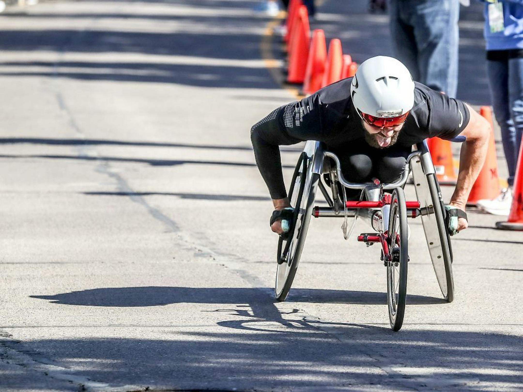 Aaron Pike of Savoy, Ill. pushes his wheelchair Saturday at the finish line area of the Grandma's Marathon in Canal Park in Duluth.