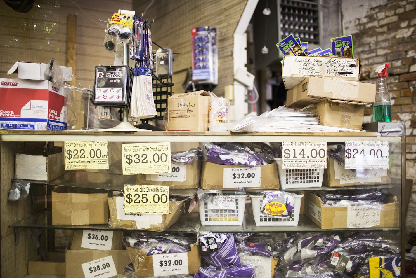 Merchandise on display at Dome Souvenirs in downtown Minneapolis on Friday, August 28, 2015. ] LEILA NAVIDI leila.navidi@startribune.com / BACKGROUND INFORMATION: Dome Souvenirs, the longtime sporting goods shop across from the former Metrodome, is moving to St. Louis Park.