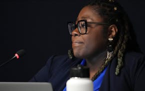 Minneapolis City Council Member Robin Wonsley speaks about the statewide plan that will create minimum pay for Uber and Lyft drivers during a council