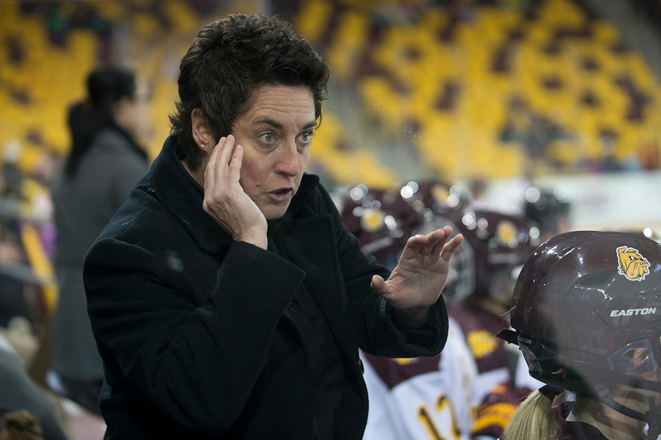 University of Minnesota Duluth head coach Shannon Miller shows intensity while instructing forward Demi Crossman during the first period of Saturday night's game. ] (Aaron Lavinsky | StarTribune) University of Minnesota Duluth told women's hockey head coach Shannon Miller that this season would be the las of her successful run as the Bulldog's coach. After five national championships, an NCAA record, and 11 Frozen Four Victories, Miller, the highest-paid coach in women's hockey, was told her con
