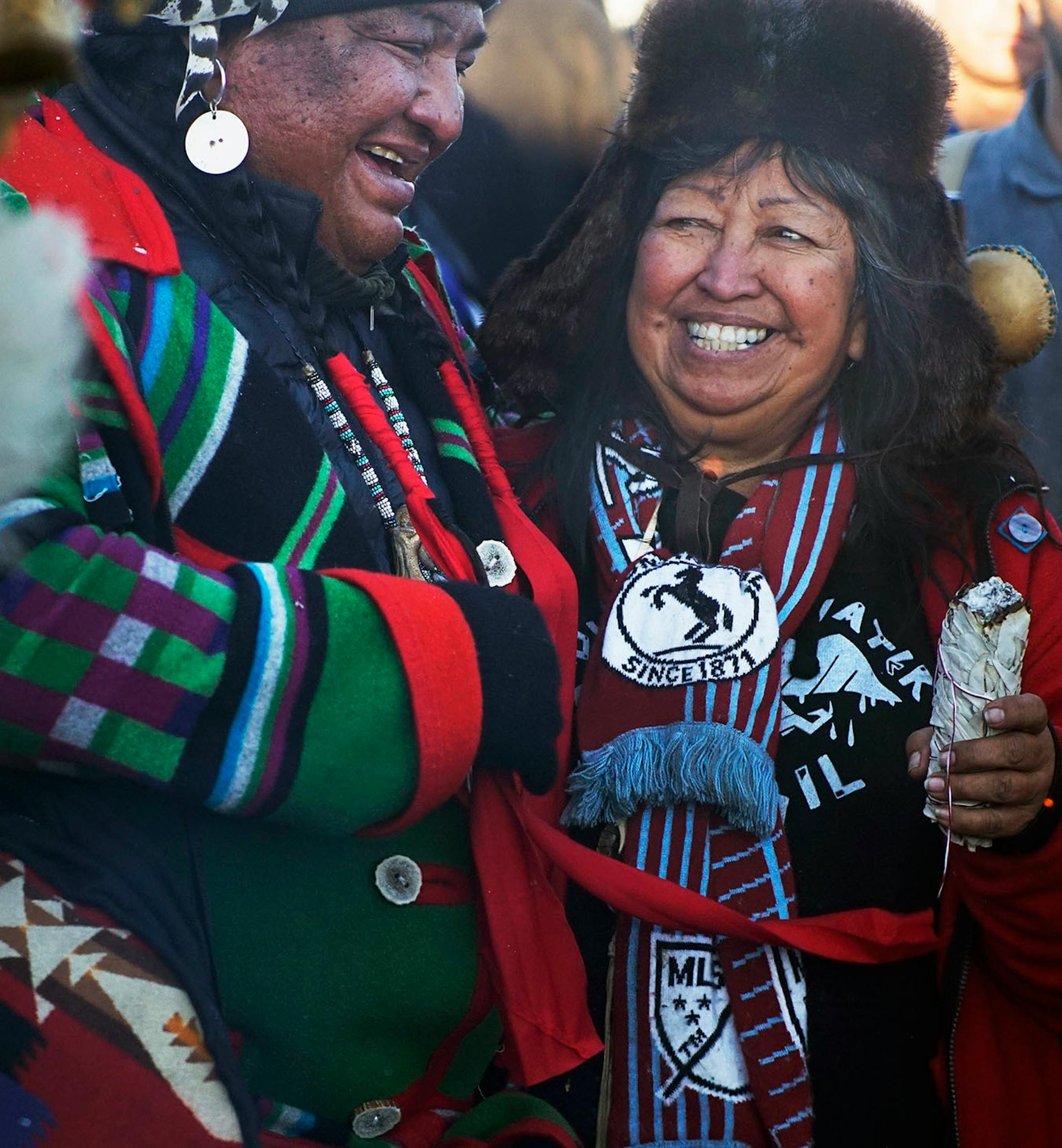 The mood was celebratory around the sacred fire where drumming and singing was prevalent after the news was announced Sunday.