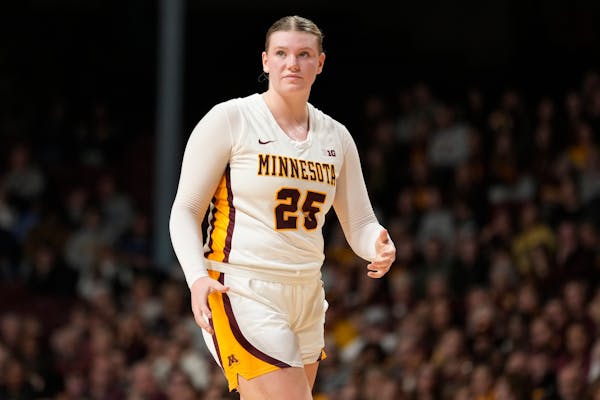 Minnesota's Grace Grocholski, shown against UConn on Nov. 19, hit an important three-pointer late in Wednesday night's 74-69 win at Troy (Ala.).