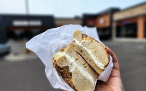 A bagel stuffed with scallion cream cheese from ElMar's New York Pizza in Plymouth.