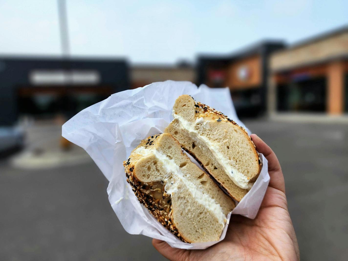 A bagel stuffed with scallion cream cheese from ElMar's New York Pizza in Plymouth.