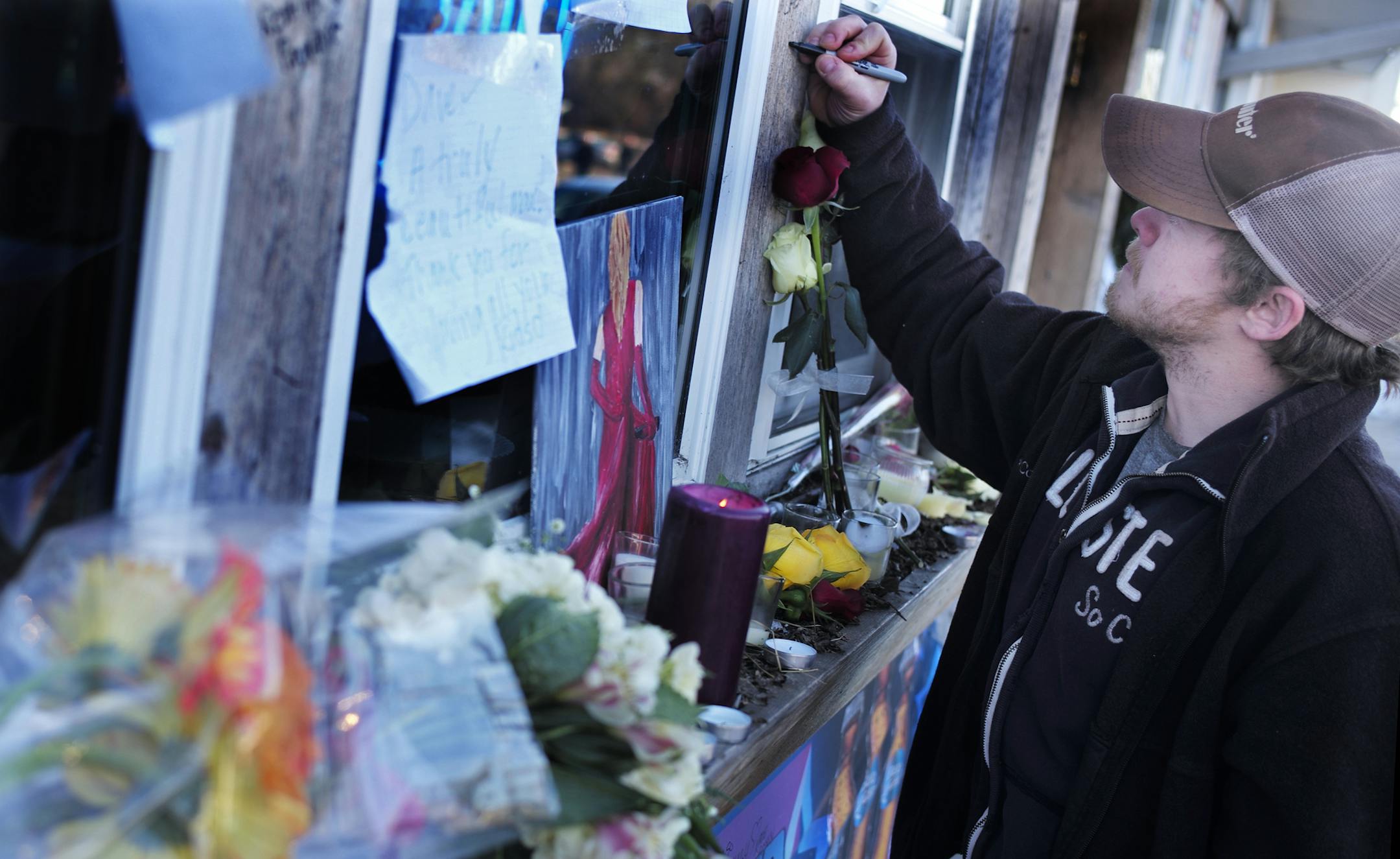 AT Frigaard's in Willernie, regular Casey Weber thanked the murdered owner Dave Frigaard with a tribute, "Thank you for providing my 'Cheers', a reference to the popular television show set in a bar.] Richard Tsong-Taatatarii@startribune.com