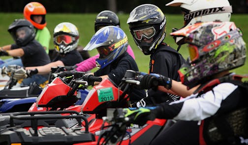 Youthful ATV riders waited for instructions from DNR safety instructors. ] JIM GEHRZ &#x201a;&#xc4;&#xa2; jgehrz@startribune.com / Farmington, MN 6/28, 2014 / 9:00 AM / BACKGROUND INFORMATION: The Minnesota DNR conducted a training class for ATV riders, particularly aimed at younger riders at the Dakota County Fairgrounds in Farmington. Jay Peterson was among the instructors. This is hands on training with machines and includes obstacle course. This will accompany a package of stories about the