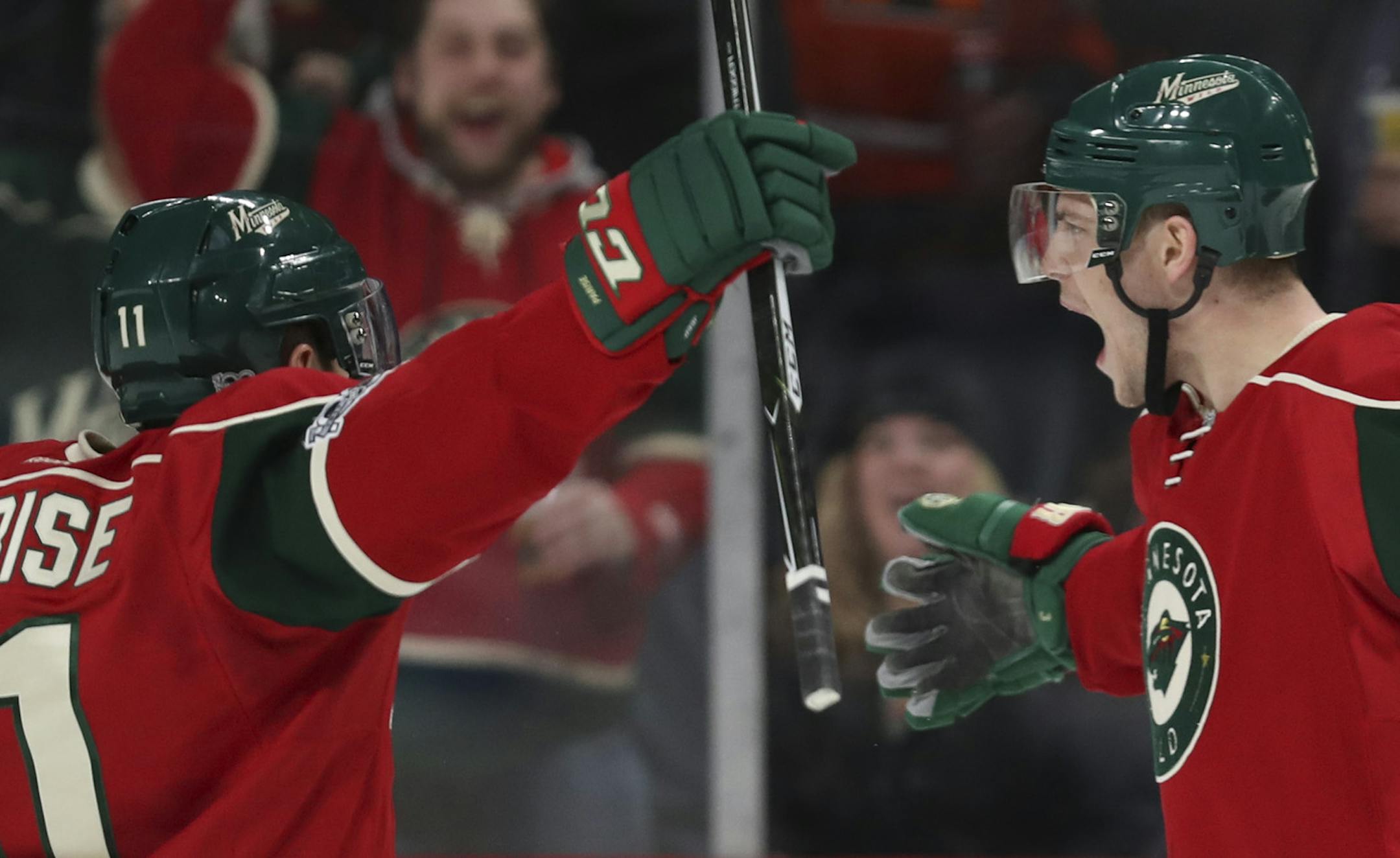 Minnesota Wild center Charlie Coyle (3) prepared to celebrate with left wing Zach Parise (11) and defenseman Jared Spurgeon (46) after he scored what proved to be the game winner in the second period. ] JEFF WHEELER ï jeff.wheeler@startribune.com The MInnesota Wild faced the San Jose Sharks in an NHL hockey game Tuesday night, March 21, 2017 at Xcel Energy Center in St. Paul.
