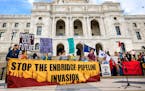 Pipeline opponents rallied on the steps of the State Capitol to oppose the proposed Enbridge Line 3 tar sands pipeline expansion. ] GLEN STUBBE &#xef;