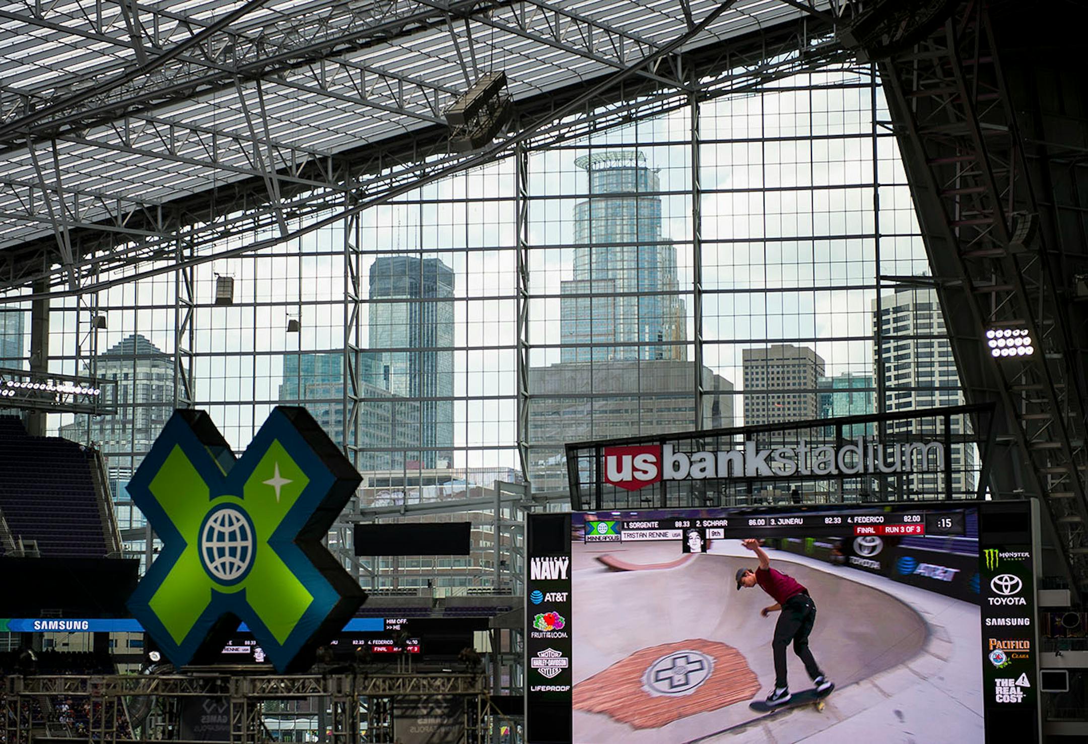 The Minneapolis skyline was visible from beyond one of US Bank Stadium's big-screen displays during the skateboarding park finals Sunday.