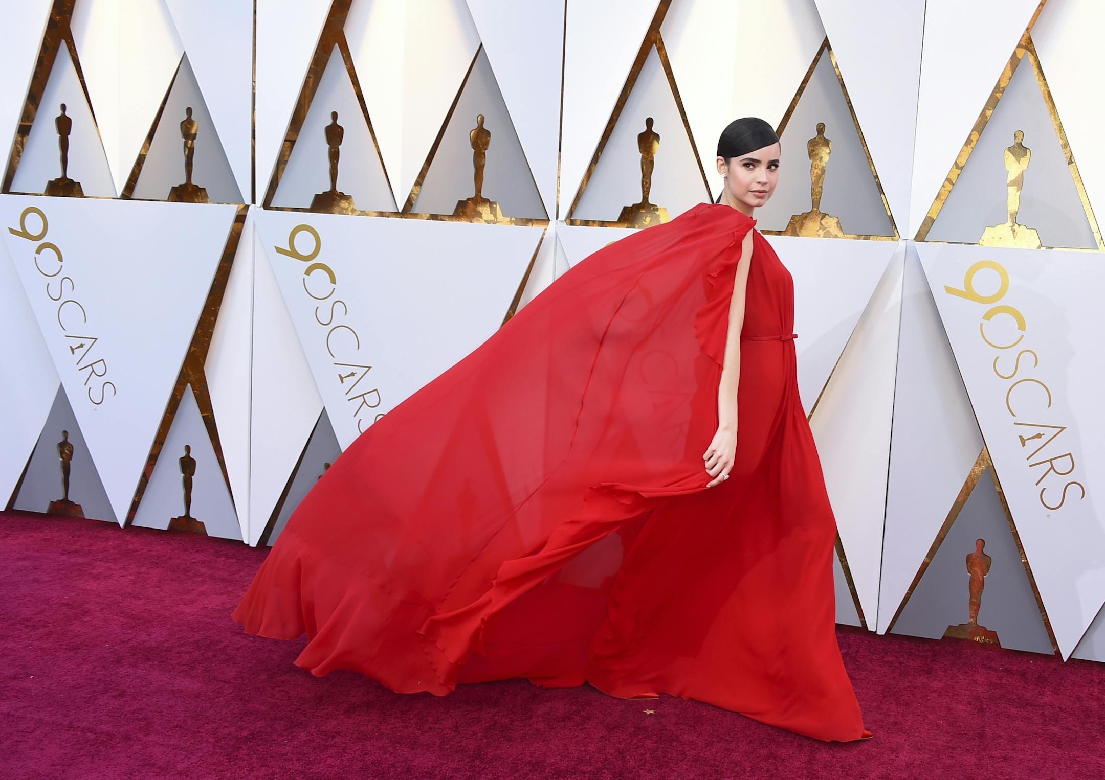 Sofia Carson arrives at the Oscars on Sunday, March 4, 2018, at the Dolby Theatre in Los Angeles.