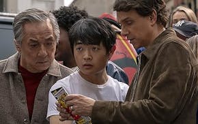 Northfield actor Ben Wang finds himself between "Karate Kid" favorites Jackie Chan and Ralph Macchio.