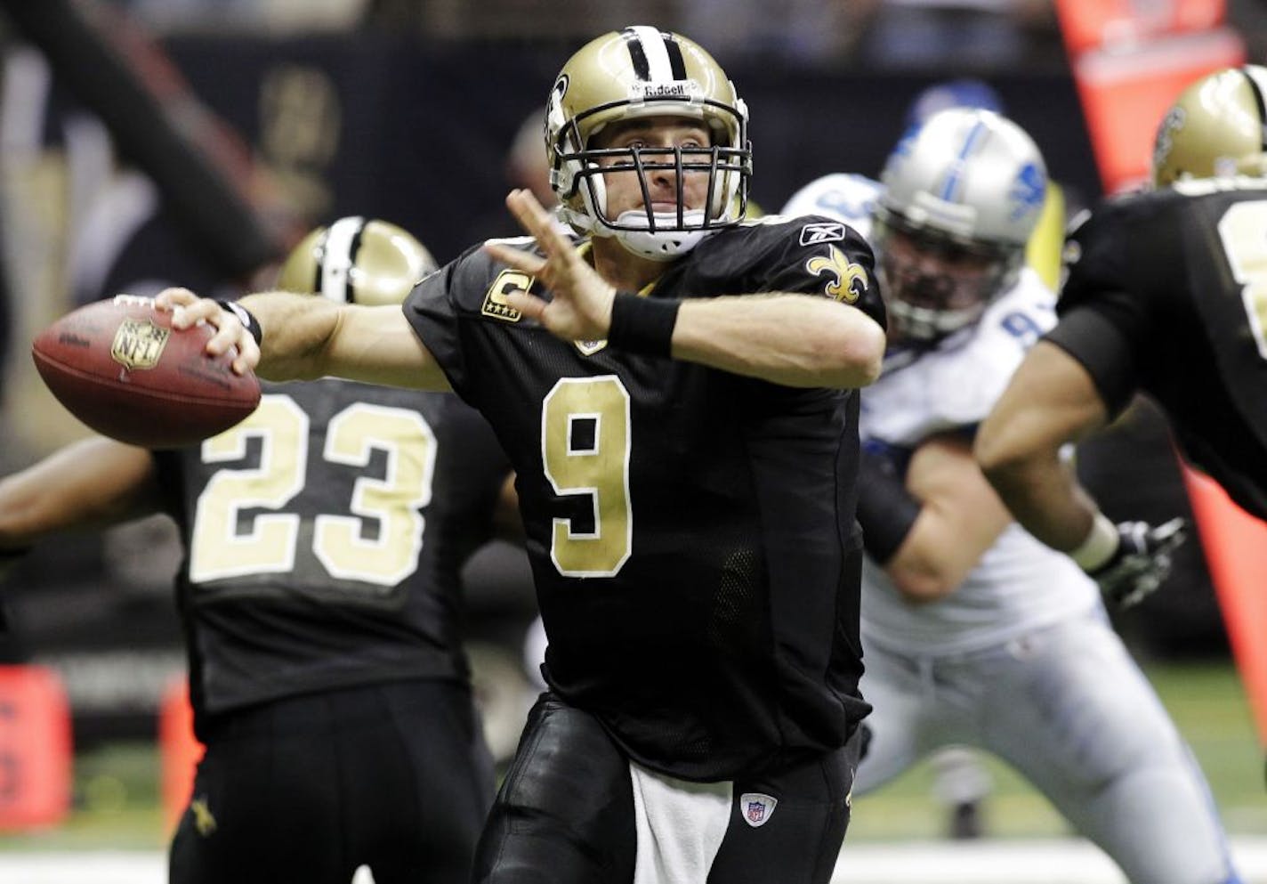 New Orleans Saints quarterback Drew Brees (9) passes during the first quarter of an NFL football game against the Detroit Lions in New Orleans, Sunday, Dec. 4, 2011.