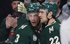 Charlie Coyle, left, and Nino Niederreiter with the Wild.