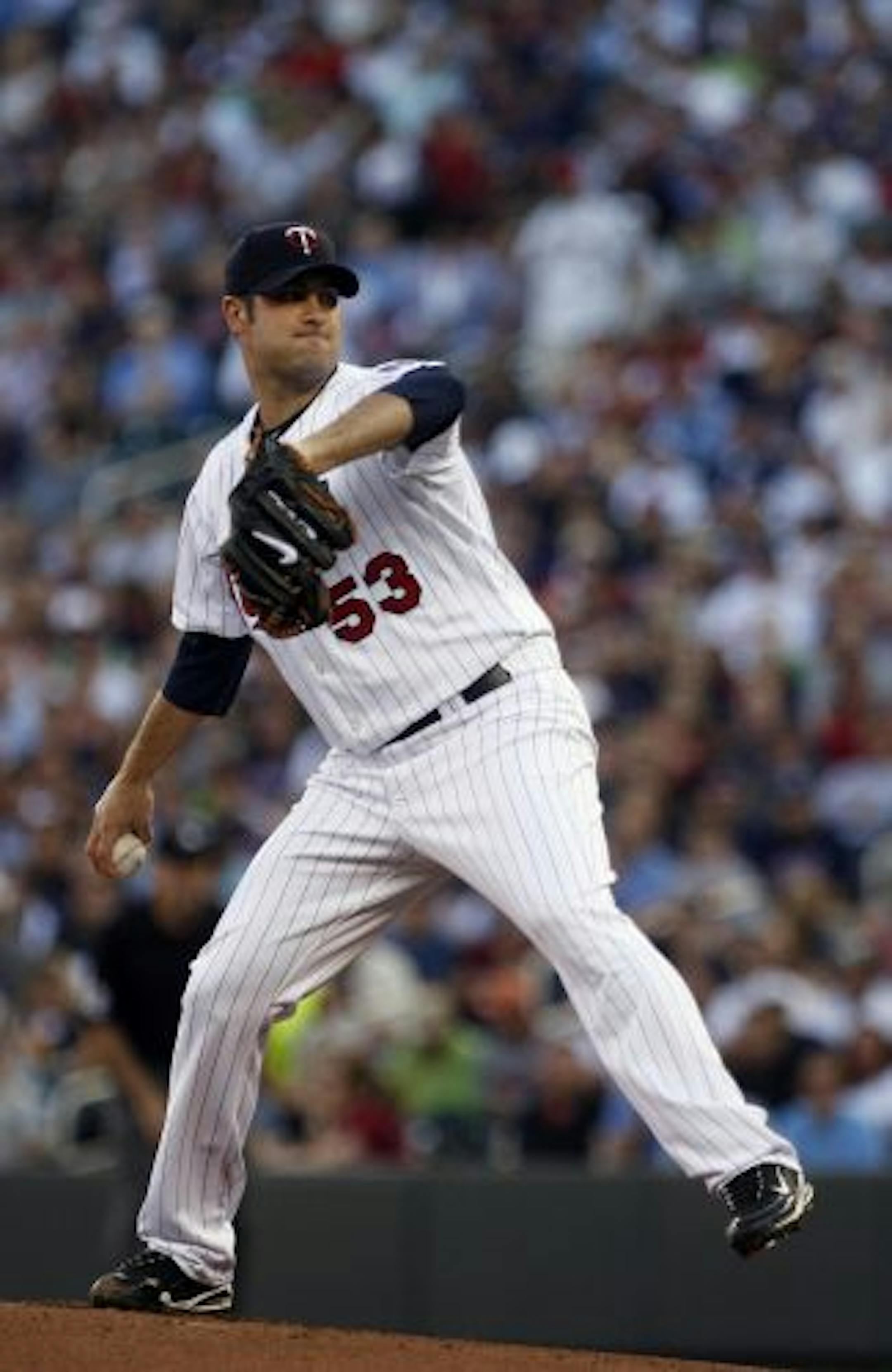 Twins starting pitcher Nick Blackburn throws a pitch in the first inning.