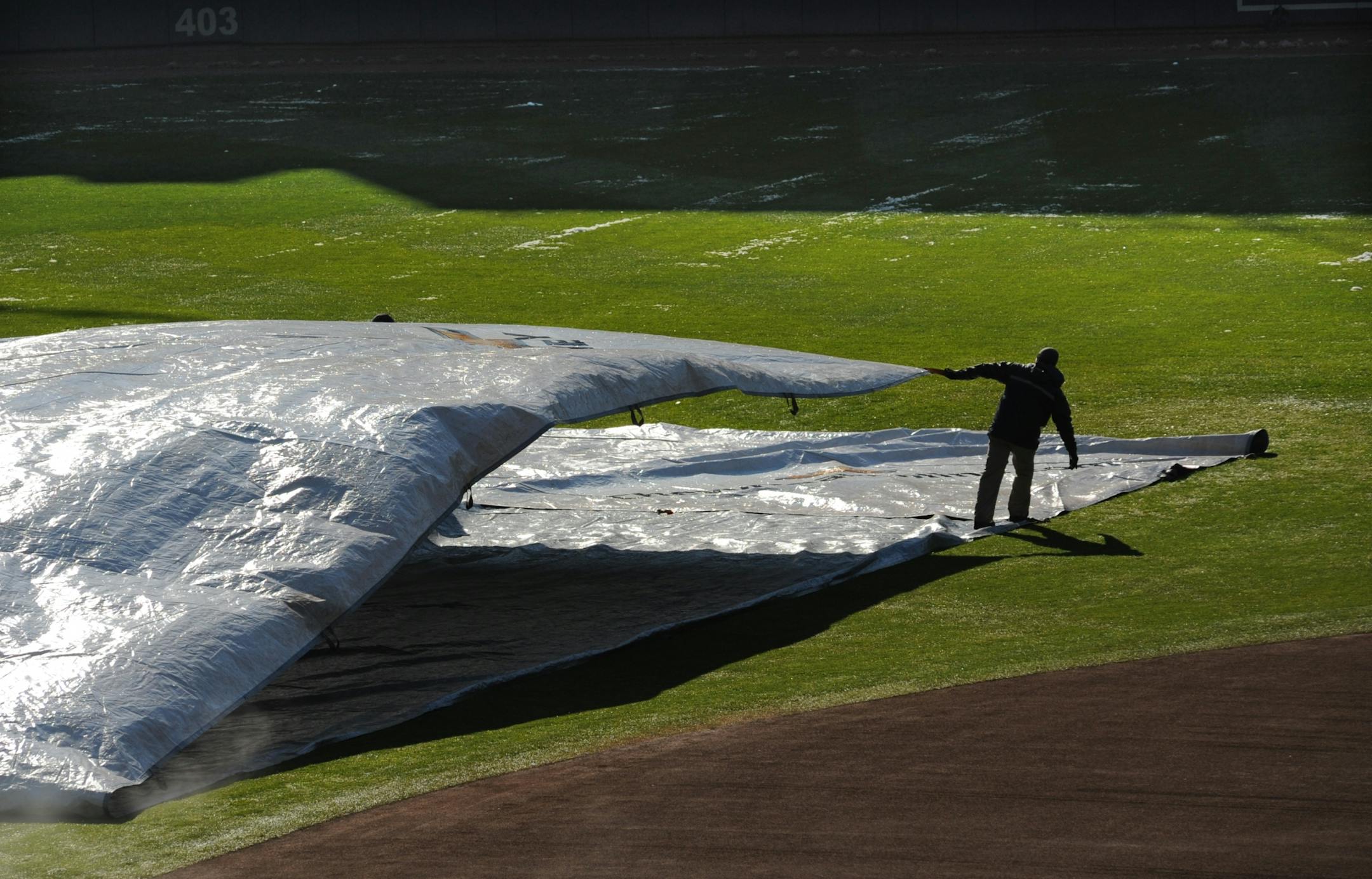 The Metro are got between 4 to 6 inches of snow. Minnesota Twins grounds crew worked through the night and continued early Tuesday to prep Target Field for a chilly afternoon and evening of baseball.