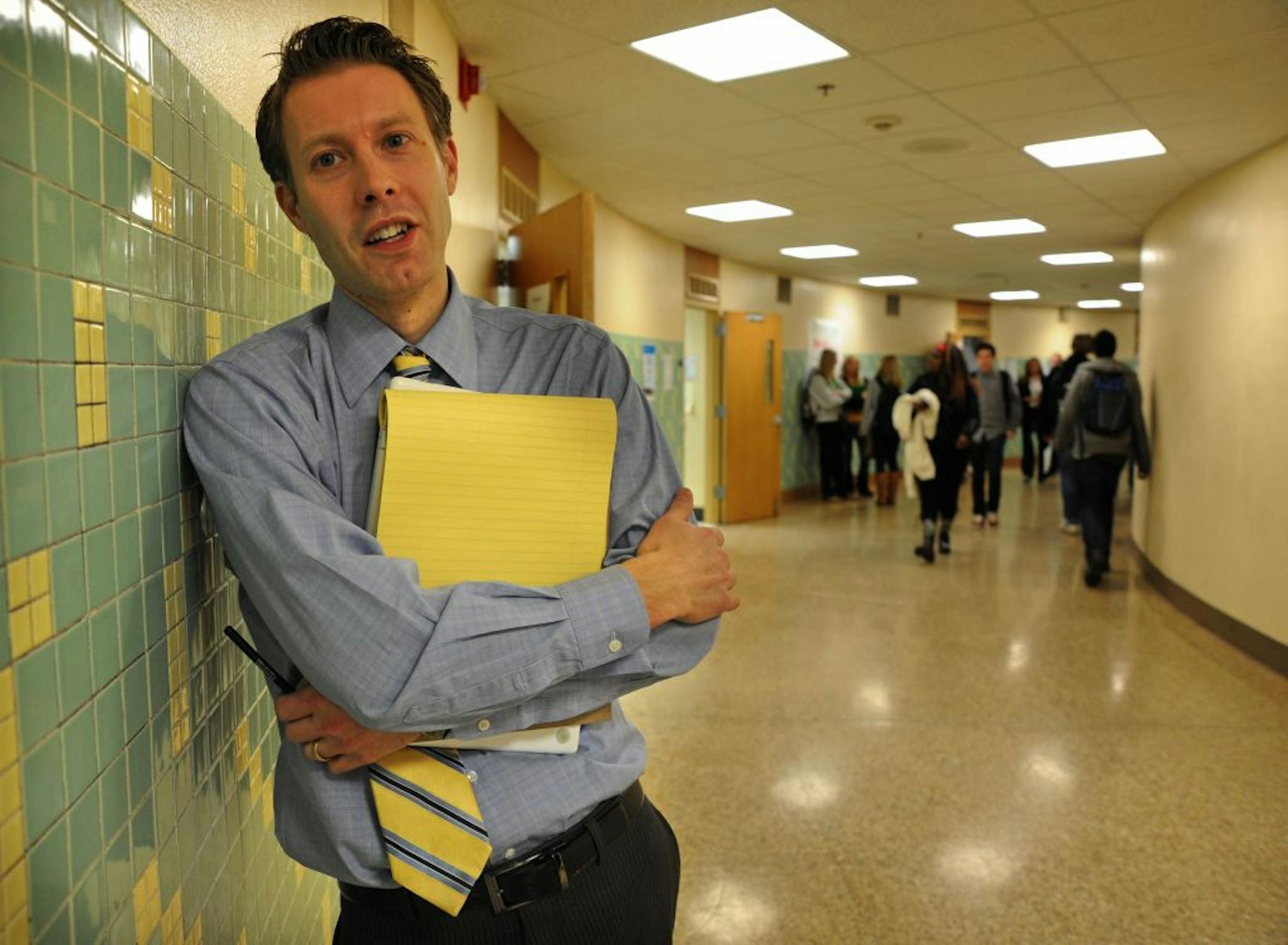 Justin Barbeau, i3, investing in inovation grant coordinator in the hallway of St Louis Park High. Hudson, Wis. High School officials and teachers toured St Louis Park High on Wednesday, December 14, 2011 to see the ninth-grade program that the high school has had in place for 13 years. The Wisconsin school is interested in starting it in their school district. Last month, an Australian school visited and schools from across the metro and world have been visiting to learn about St. Louis Park's