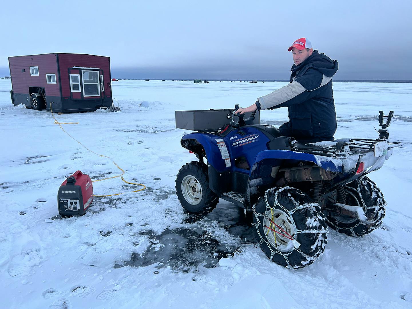 Lindy Frasl of Brainerd towed his wheelhouse onto the Upper Red Lake ice with his chained-up four-wheeler.&nbsp;