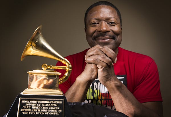 Gary Hines, music director and producer for the group Sounds of Blackness with his Grammy award at Sabathani Community Center in Minneapolis on Wednes