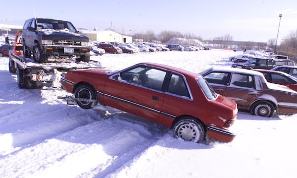 SAINT PAUL, MN - THUR - 1/13/2000 - St Paul declared a snow emergency and lots of vehicles were towed to the St. Paul Car Impound Lot, Como Ave, 2 blo