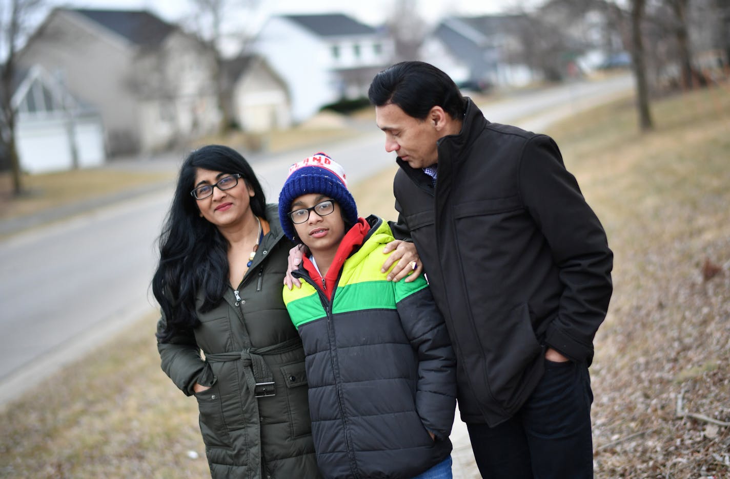 Kuhu Singh with her husband Rajeev and their son Puru, 12, walked through their Eden Prairie neighborhood.