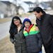 Kuhu Singh with her husband Rajeev and their son Puru, 12, walked through their Eden Prairie neighborhood.