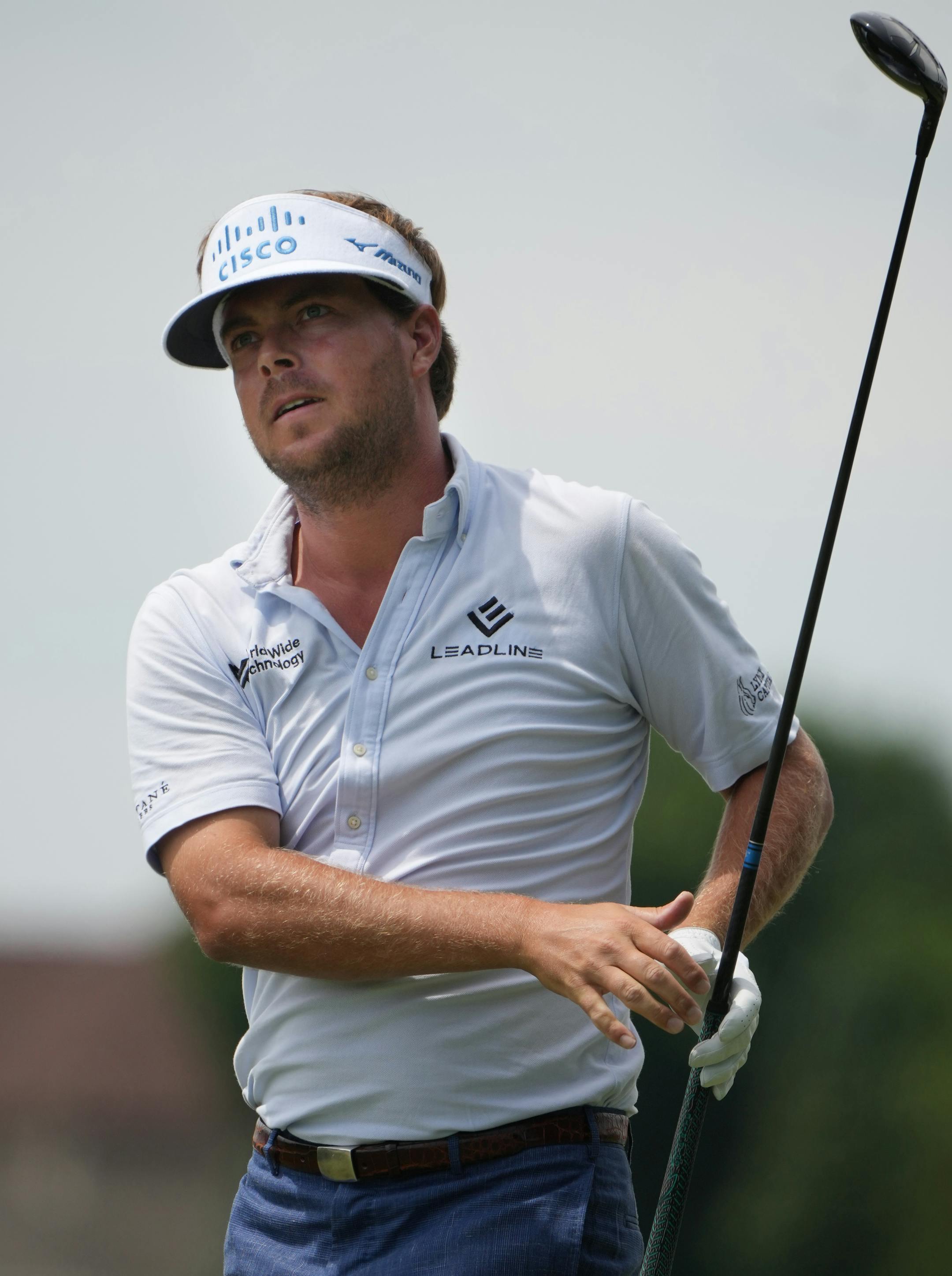 Keith Mitchell watches his tee shot on the 5th hole Sunday at TPC Twin Cities.