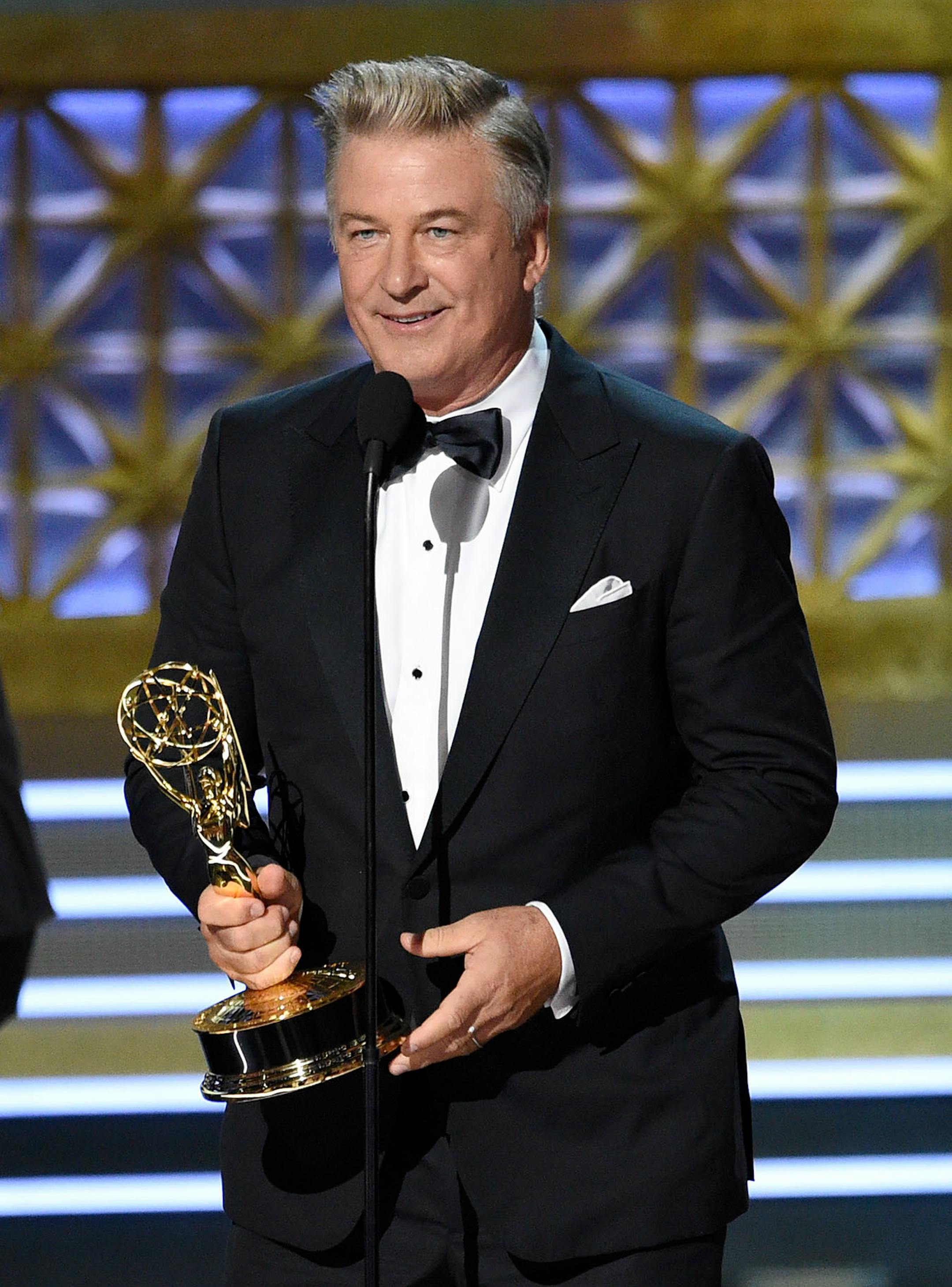 Alec Baldwin accepts the award for outstanding supporting actor in a comedy series for "Saturday Night Live" at the 69th Primetime Emmy Awards on Sunday, Sept. 17, 2017, at the Microsoft Theater in Los Angeles.