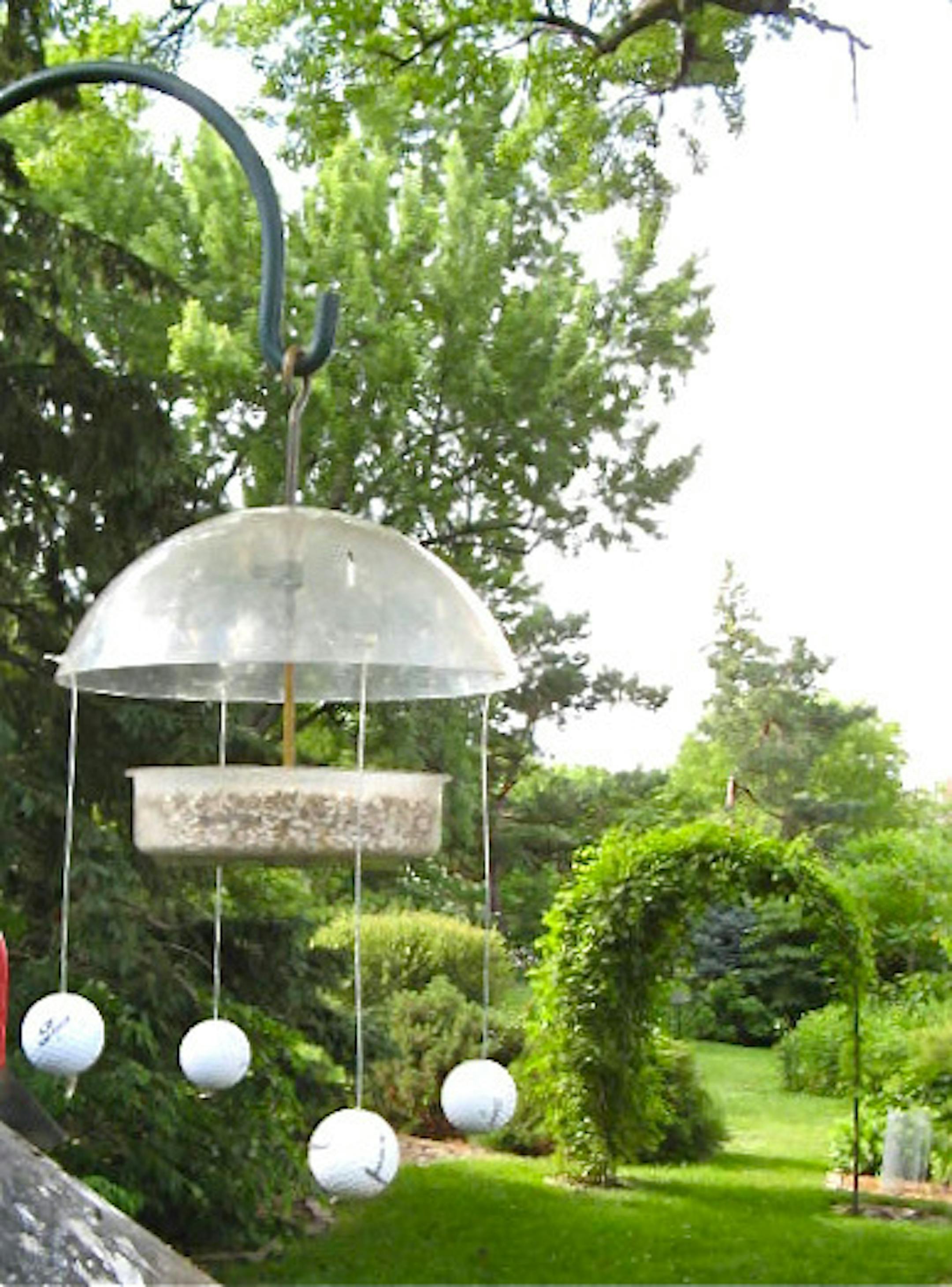 Homemade bird "halo" device to deter sparrows credit: Val Cunningham