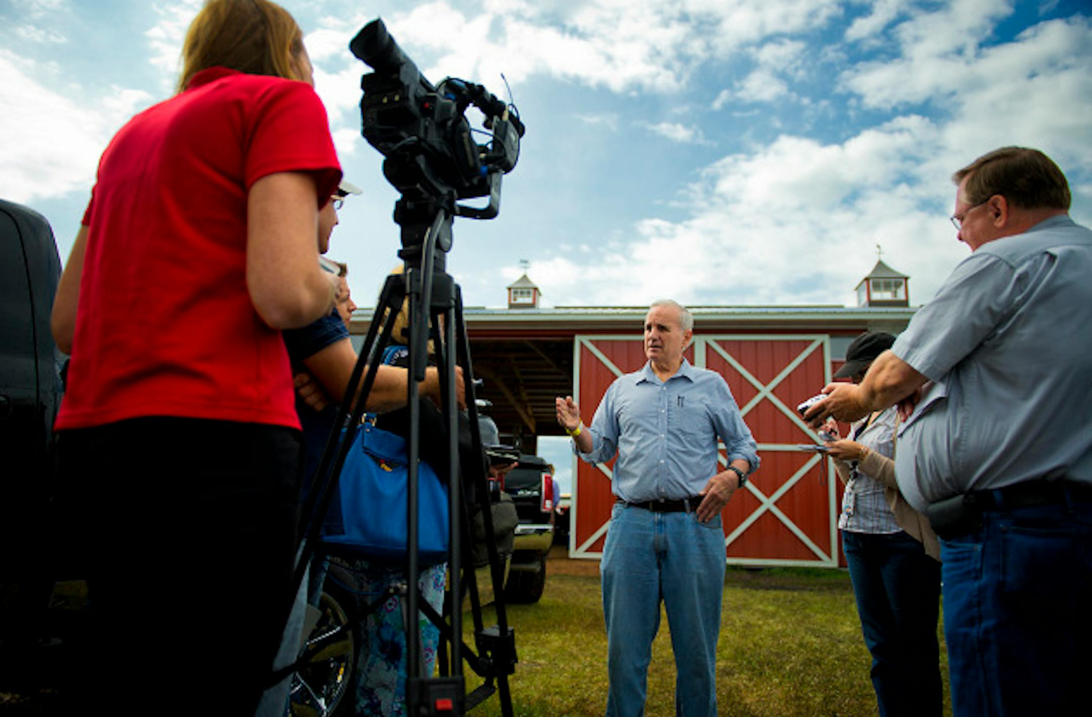 Governor Mark Dayton spoke to the media after delivering the keynote speech at Farmfest the outstate agricultural trade show held each year at Gilfillian Estate in Redwood County, Minnesota,  Thursday August 8, 2013   ]   GLEN STUBBE * gstubbe@startribune.com