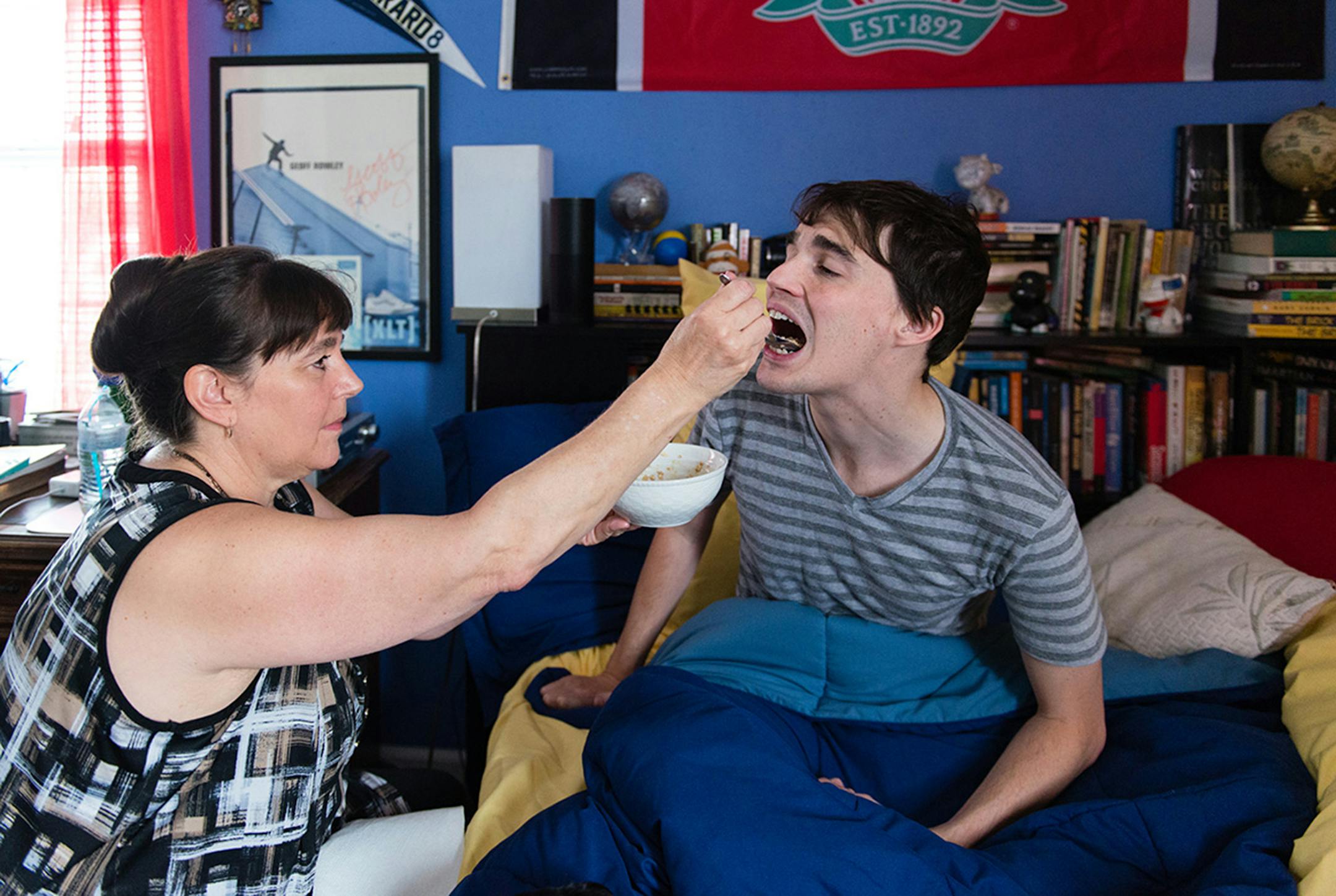 Due to a rare disease, 28-year-old Andrew Whittaker can no longer feed or dress himself. (Heidi de Marco/Kaiser Health News/TNS) ORG XMIT: 1201027