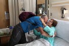 Gerard Murphy shared a hug with his friend Kathy Kehrberg who he donated a kidney to before heading home Thursday.