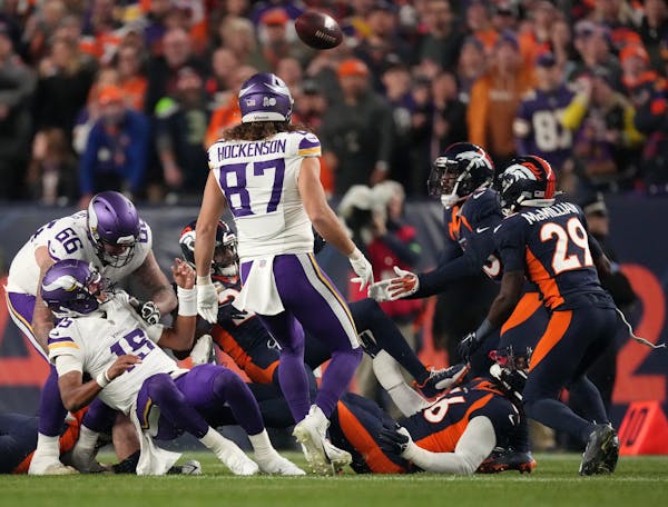 Minnesota Vikings quarterback Joshua Dobbs (15) fumbles the ball for a turnover in the first quarter of an NFL game between the Minnesota Vikings and 