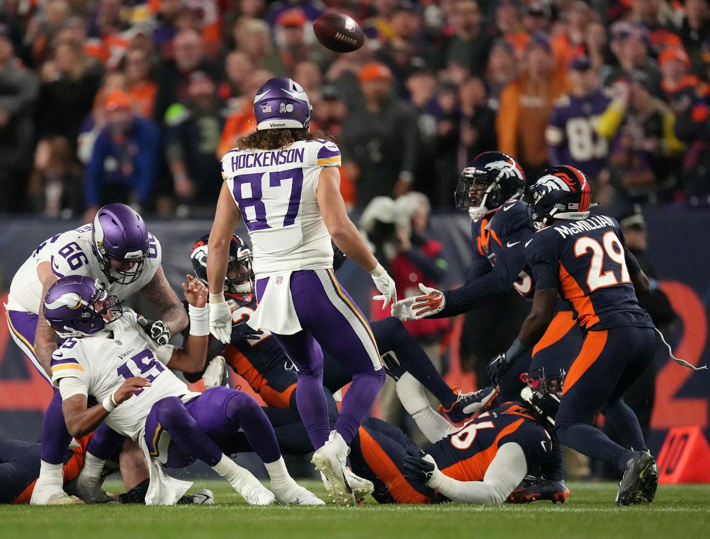 Minnesota Vikings quarterback Joshua Dobbs (15) fumbles the ball for a turnover in the first quarter of an NFL game between the Minnesota Vikings and the Denver Broncos Sunday, Nov. 19, 2023 at Empower Field at Mile High in Denver.. ] ANTHONY SOUFFLE • anthony.souffle@startribune.com