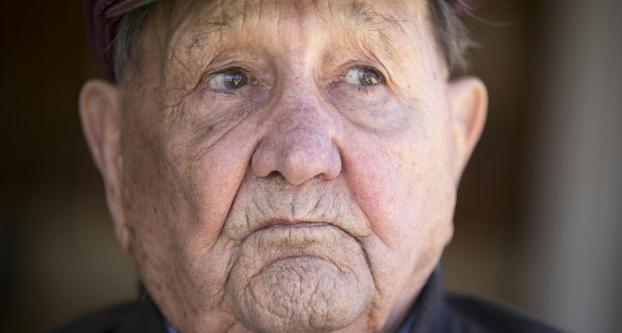 Jerry Scott, 86, discovered the dead body of his neighbor Earl Olander, who was beaten and bound, inside Olander's rural Carver, Minn. home last Saturday. Scott, seen on Tuesday, April 14, 2015 outside of his home, said "He was like a brother to me. It's like losing your brother." Scott also said he is not fearful now, because, "I keep a shotgun loaded." ] LEILA NAVIDI leila.navidi@startribune.com /