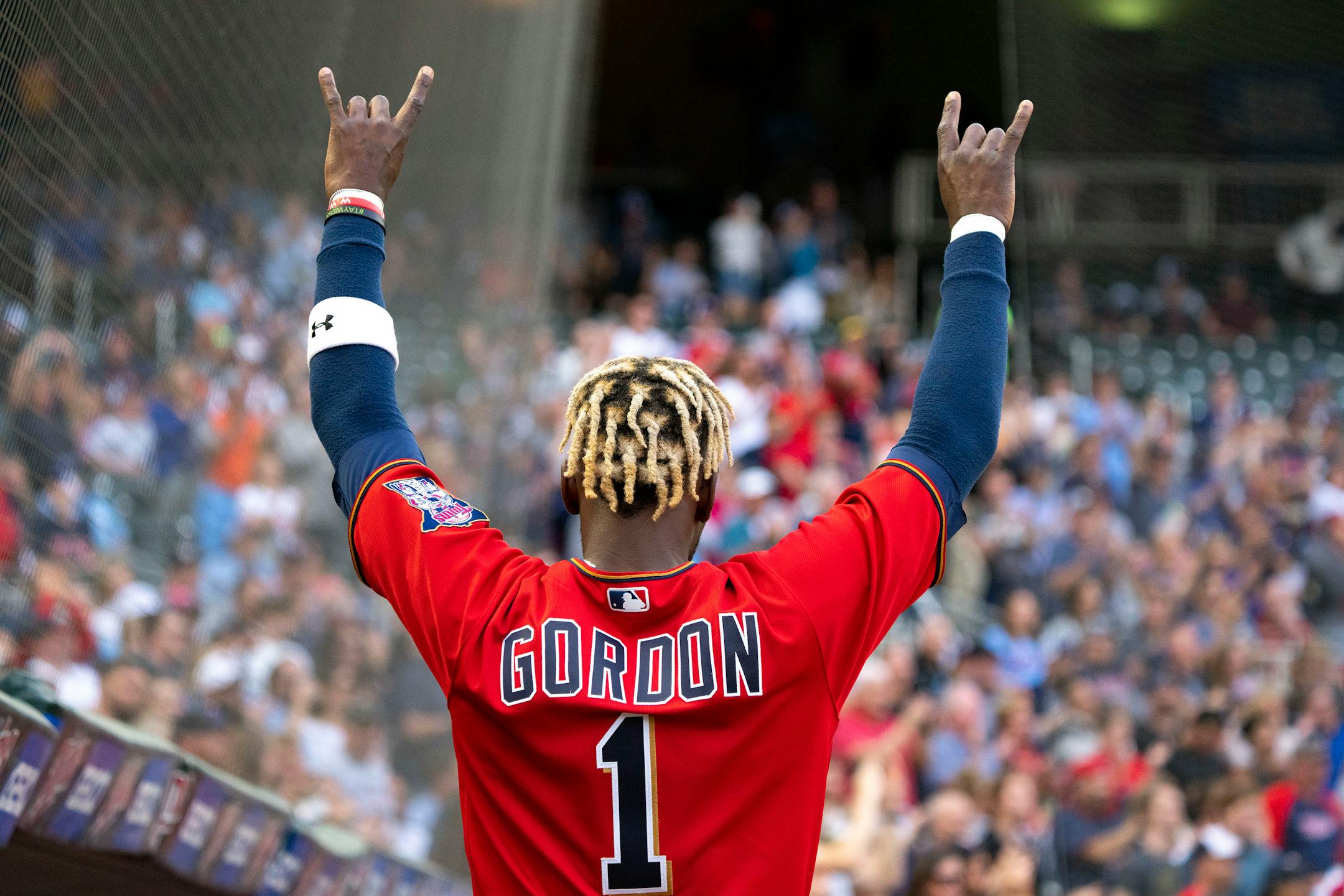 Minnesota Twins center fielder Nick Gordon (1) celebrates after Minnesota Twins second baseman Jorge Polanco (11) hit a home run in the first inning.
