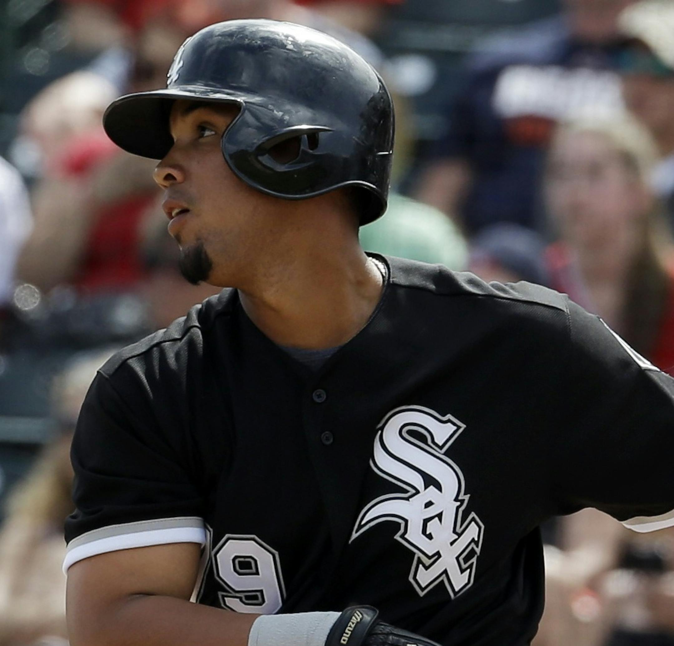 Chicago White Sox's Jose Abreu hits during an exhibition spring training baseball game against the Los Angeles Angels Thursday, March 13, 2014, in Tempe, Ariz. (AP Photo/Morry Gash) ORG XMIT: NYOTK