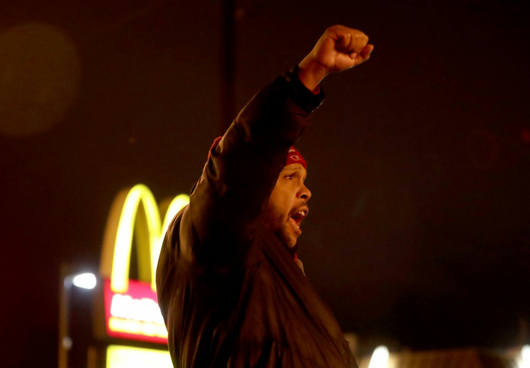 Protestors for Nationwide Fight for $15 Day of Disruption gathered outside McDonald's at 24th St. E. and Franklin Avenue, where for about a half hour protestors sat in a circle and blocked the intersection until they were arrested by Minneapolis police Tuesday, Nov. 29, 2016, in Minneapolis, MN. Here, Steven Suffridge stands with other protestors who blocked the intersection at 24th St. E. and Franklin Ave. before being taken into police custody. Those arrested were ticketed and released.
