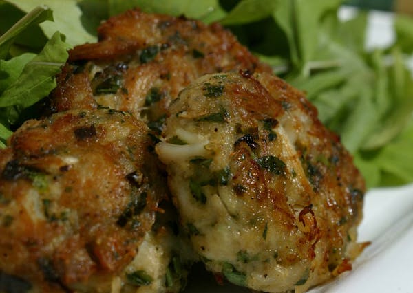 Crab cakes rarely disappoint at parties, football game or not.