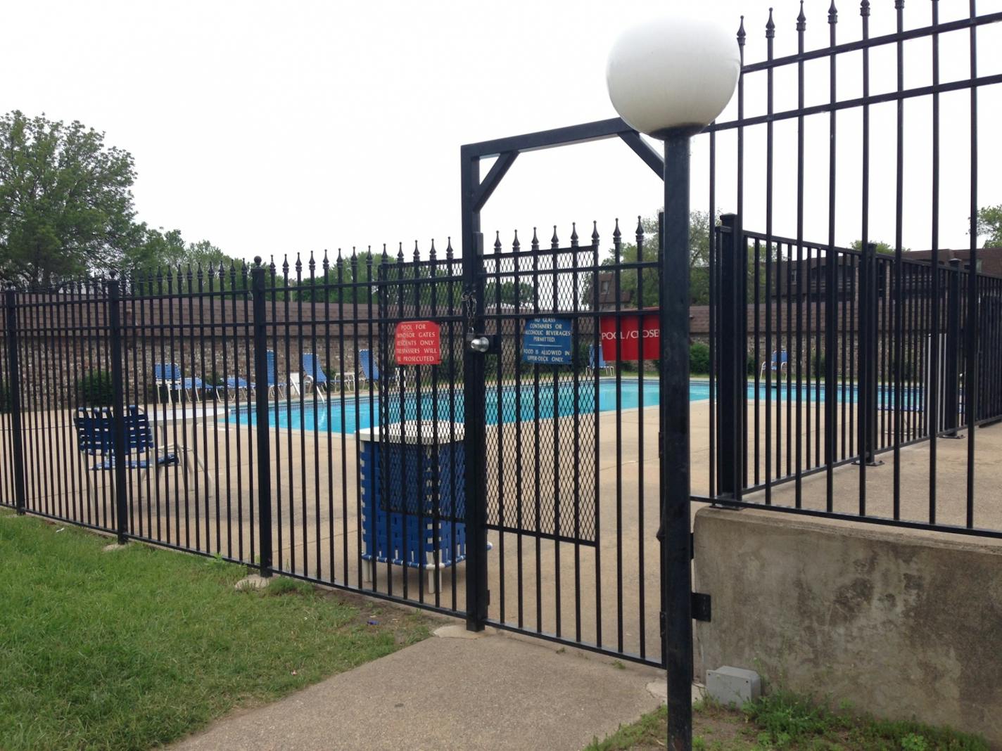 The exterior of the Brooklyn Park apartment pool, where a 3-year-old was found dead.