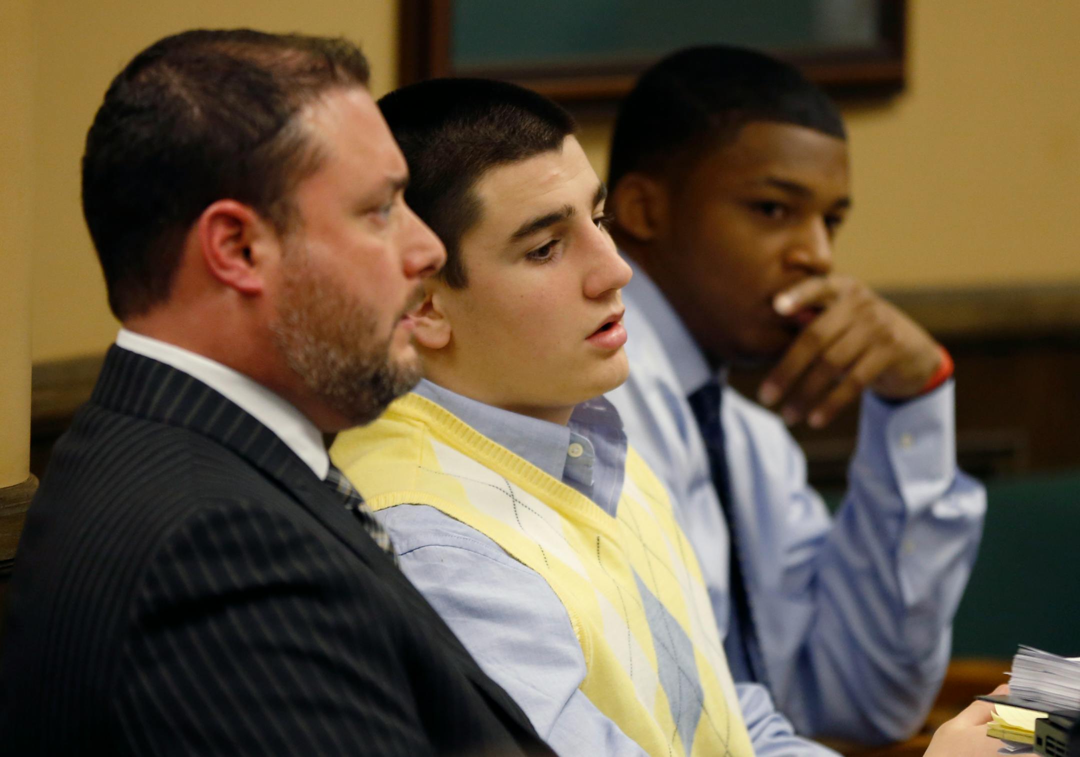From left, Defense attorney Adam Nemann, his client, defendant Trent Mays, 17, and co-defendant 16-year-old Ma'lik Richmond.