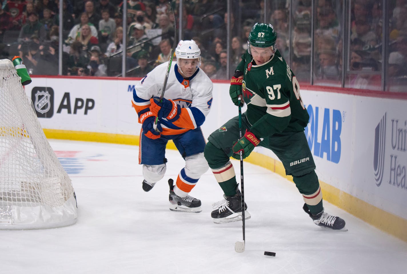 Minnesota Wild left wing Kirill Kaprizov (97) got control of the puck behind the net while pursued by New York Islanders defenseman Andy Greene (4) in the first period Sunday, Nov. 7, 2021 in St. Paul. The Minnesota Wild faced the New York Islanders in an NHL hockey game at Xcel Energy Center Sunday, Nov. 7, 2021 in St. Paul. ] JEFF WHEELER • Jeff.Wheeler@startribune.com