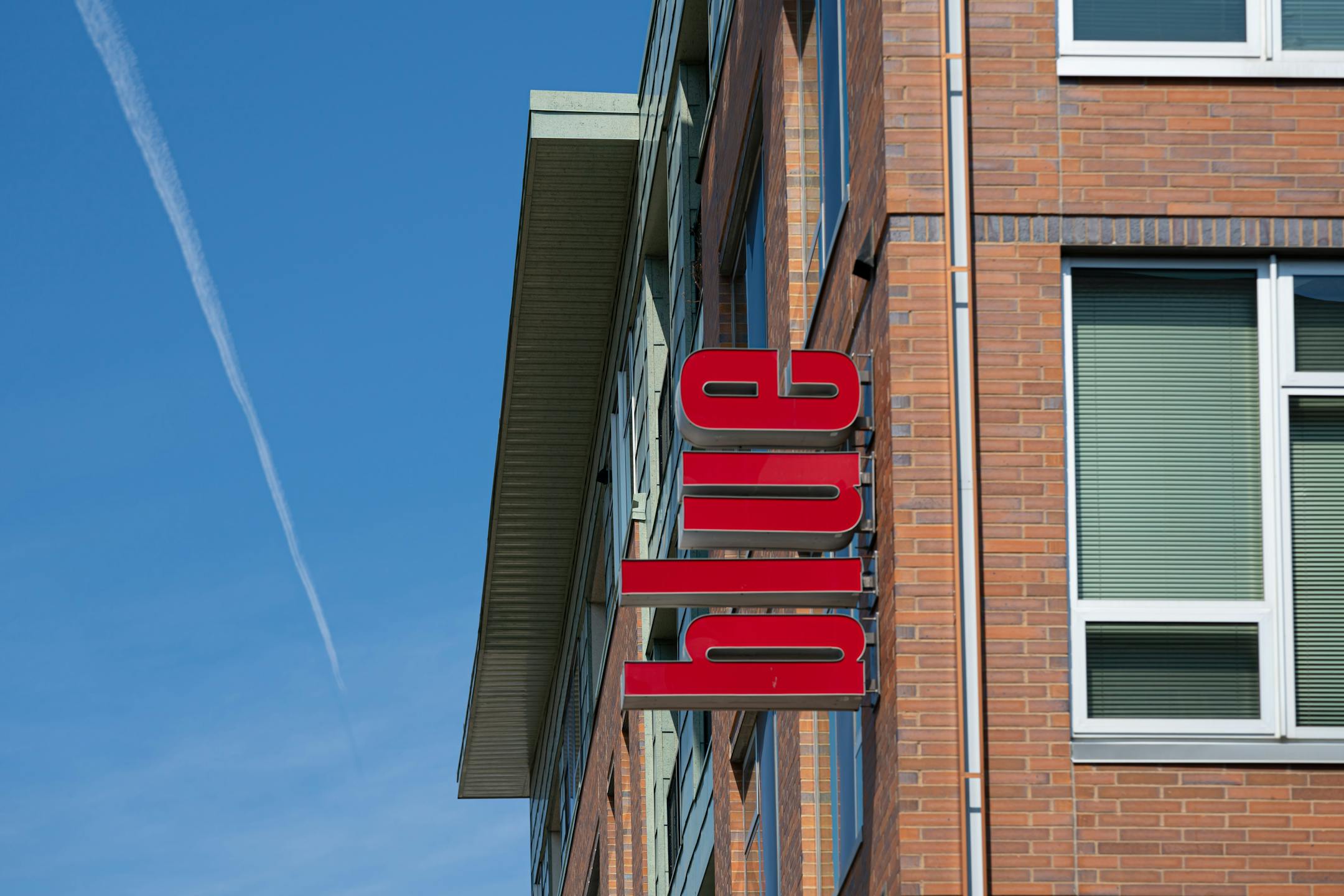 At Blue, the developer talked about how the logo and brick exterior are both red, in contrast to the building's name, to pique curiosity about why it's called blue.: https://www.move2blue.com/ Address: 2922 Aldrich Ave S, Minneapolis, MN 55408