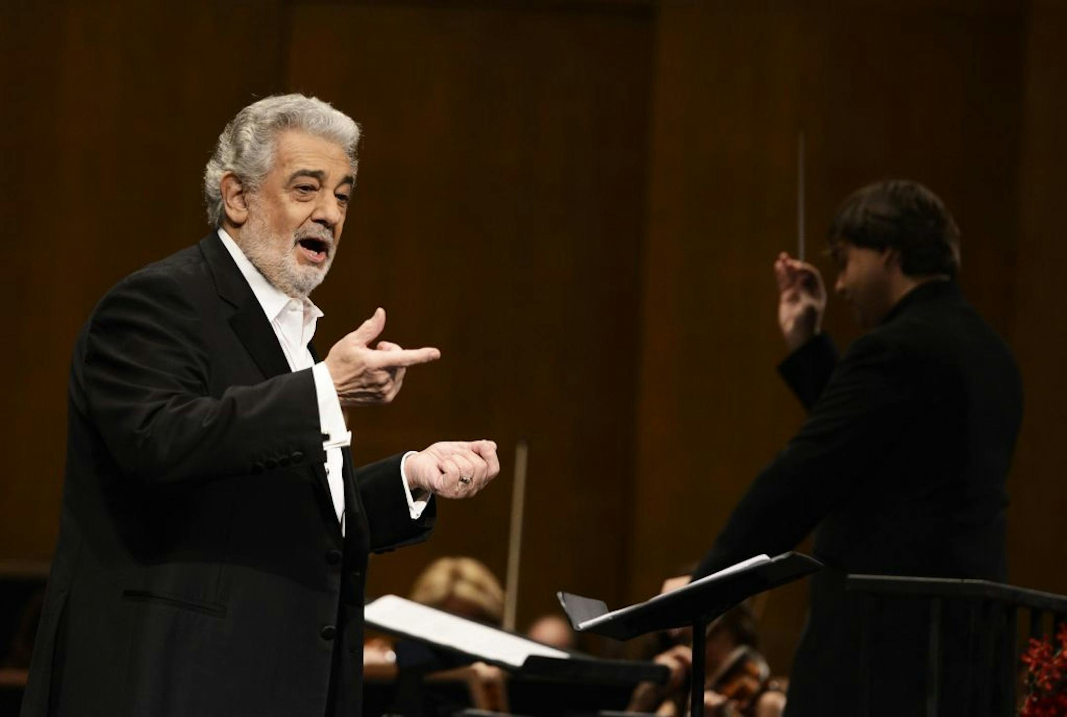 FILE - In this June 7, 2013 file photo, tenor Placido Domingo performs at the Dorothy Chandler Pavilion in Los Angeles. Domingo is in the hospital after suffering a blockage in an artery of the lungs. Domingo's publicist says the 72-year-old is expected to make a full recovery but will have to miss at least two appearances scheduled for later this month. He was admitted to the hospital Monday, July 8, 2013, in Madrid.