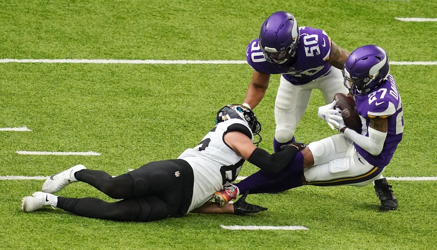 The Vikings' Cameron Dantzler (27) was the first cornerback to record an interception this season in Sunday's win over the Jaguars.