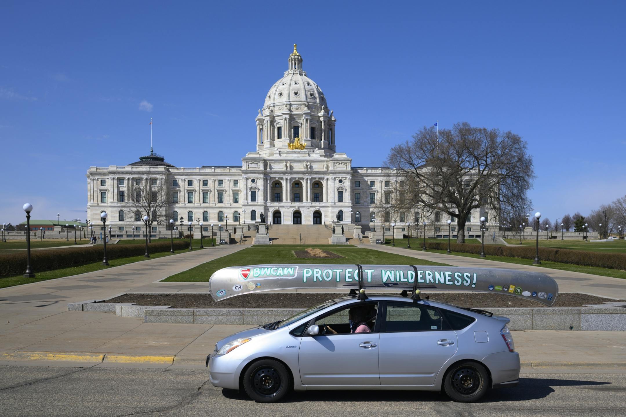 An aluminum canoe with environmental messaging was strapped to the roof of a Prius taking part in Wednesday's BWCA rally outside the state capitol.
