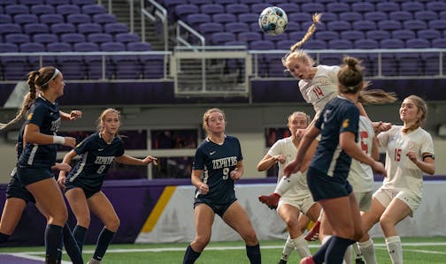 Siena Carver, of Benilde-St. Margaret's, tried to head the ball into the net on a corner kick.