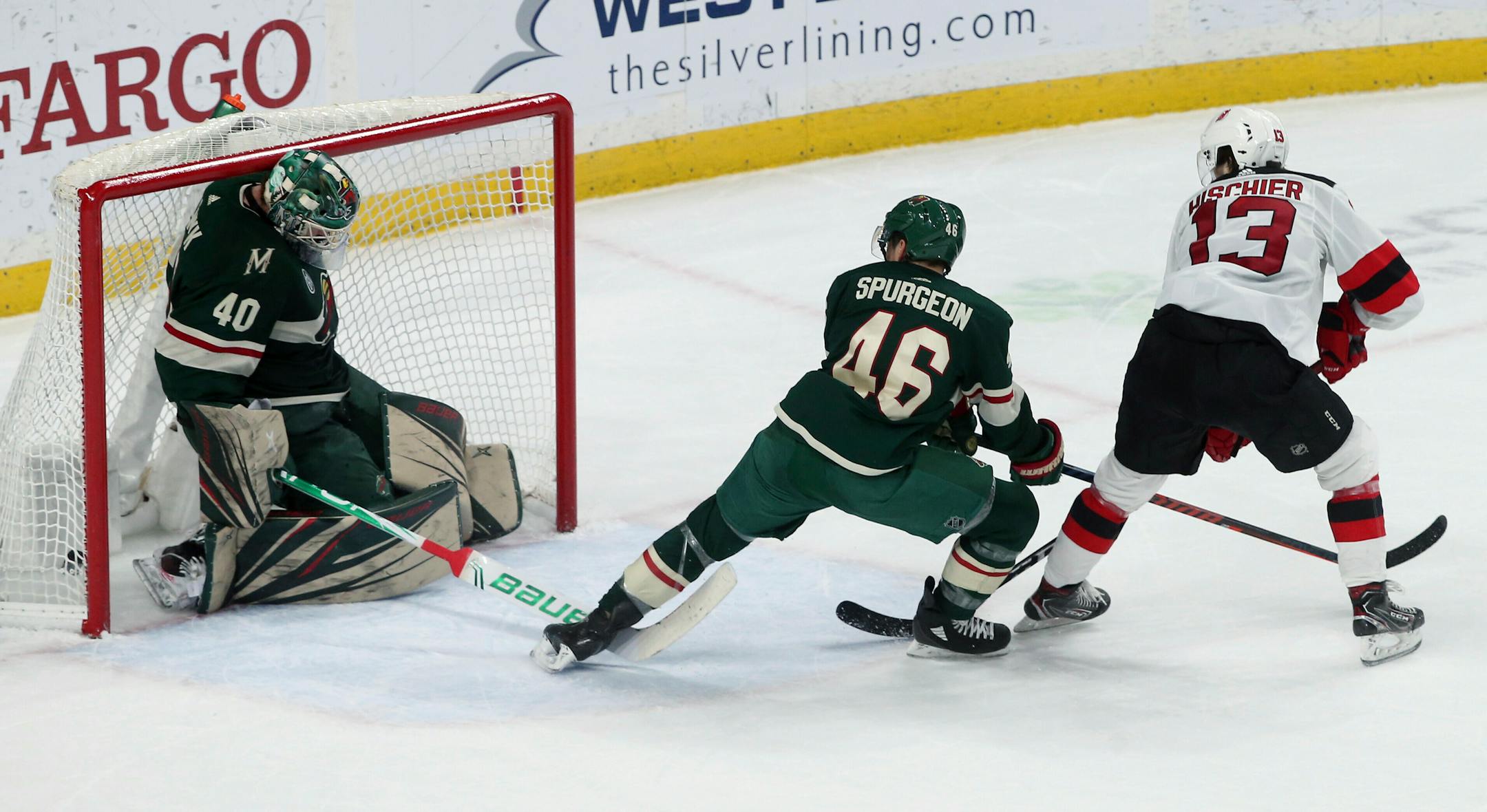 Nico Hischier, right watches his overtime goal against Wild goalie Devan Dubnyk