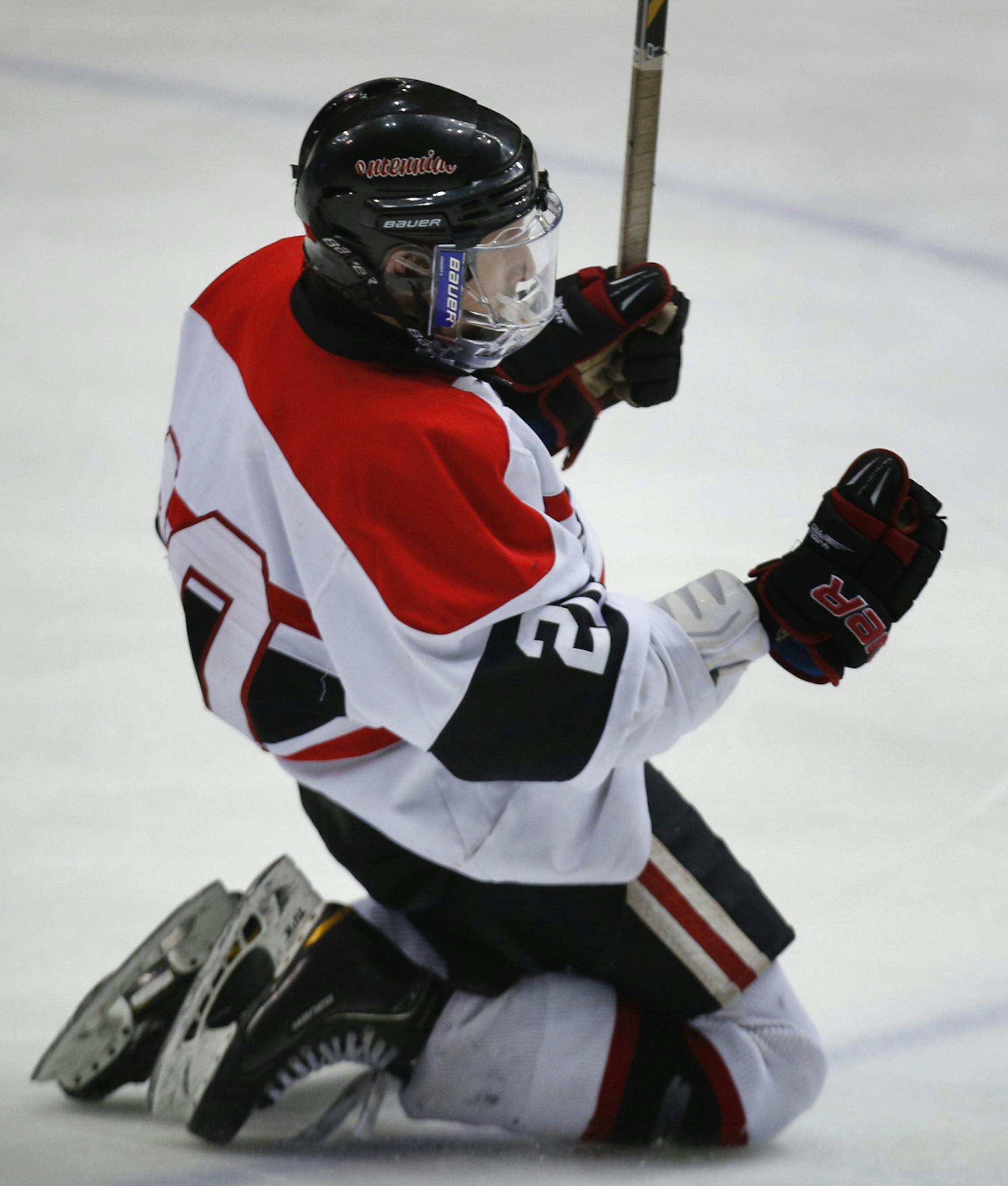 Centennial's Ryner Gorowski celebrates his second goal and game winner against Champlin Park during Centennial's 4-2 win in boys' hockey tournament section 5 finals Friday, March 1, 2013, at the State Fairgrounds Coliseum in St. Paul, MN.] (DAVID JOLES/STARTRIBUNE)boys' hockey tournament section 5 finals Friday, March 1, 2013, at the State Fairgrounds Coliseum in St. Paul, MN.**Ryner Gorowski,cq ORG XMIT: MIN1303012036310724