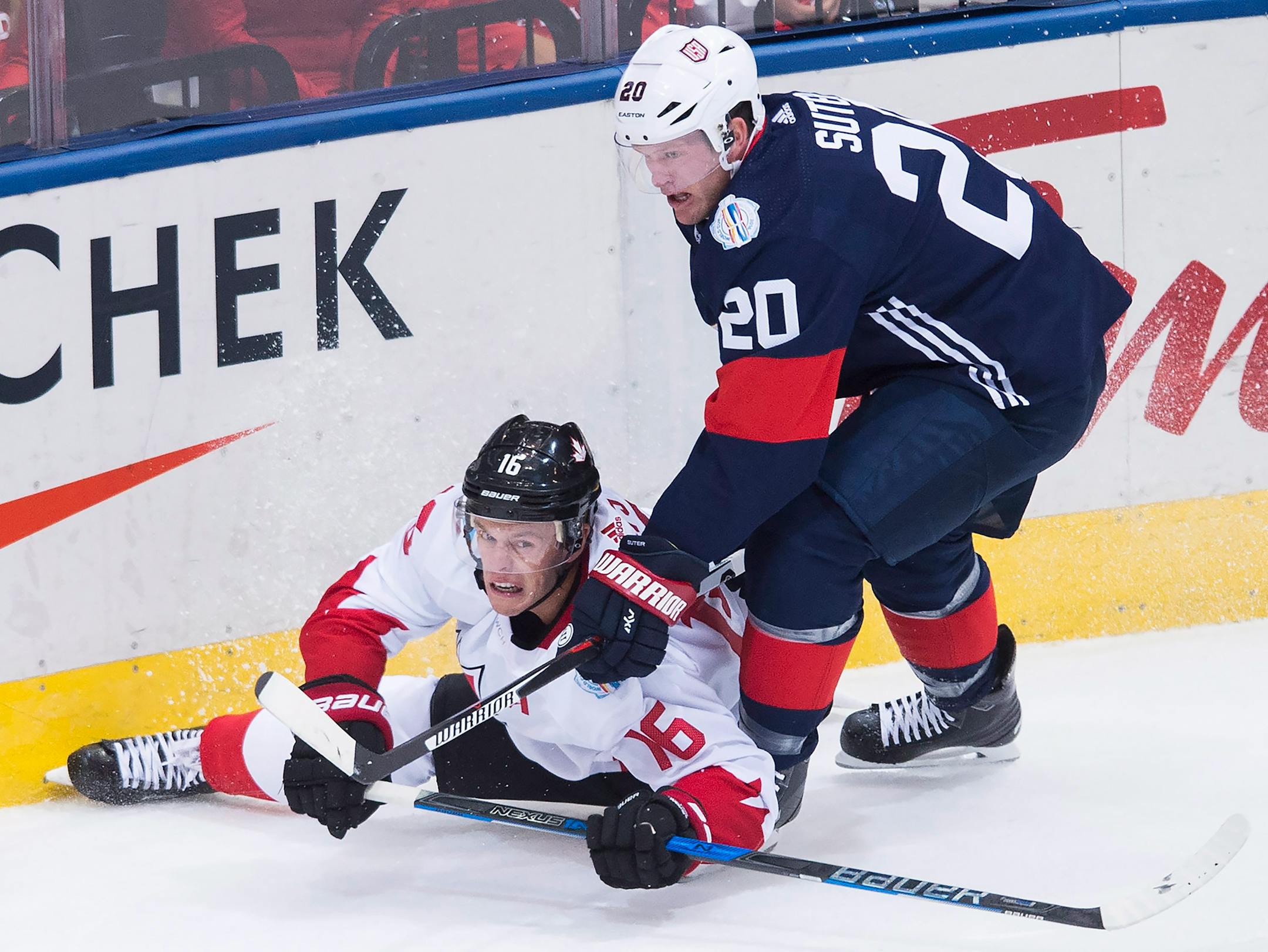 With Team USA eliminated, Wild defenseman Ryan Suter, right, can report to training camp.