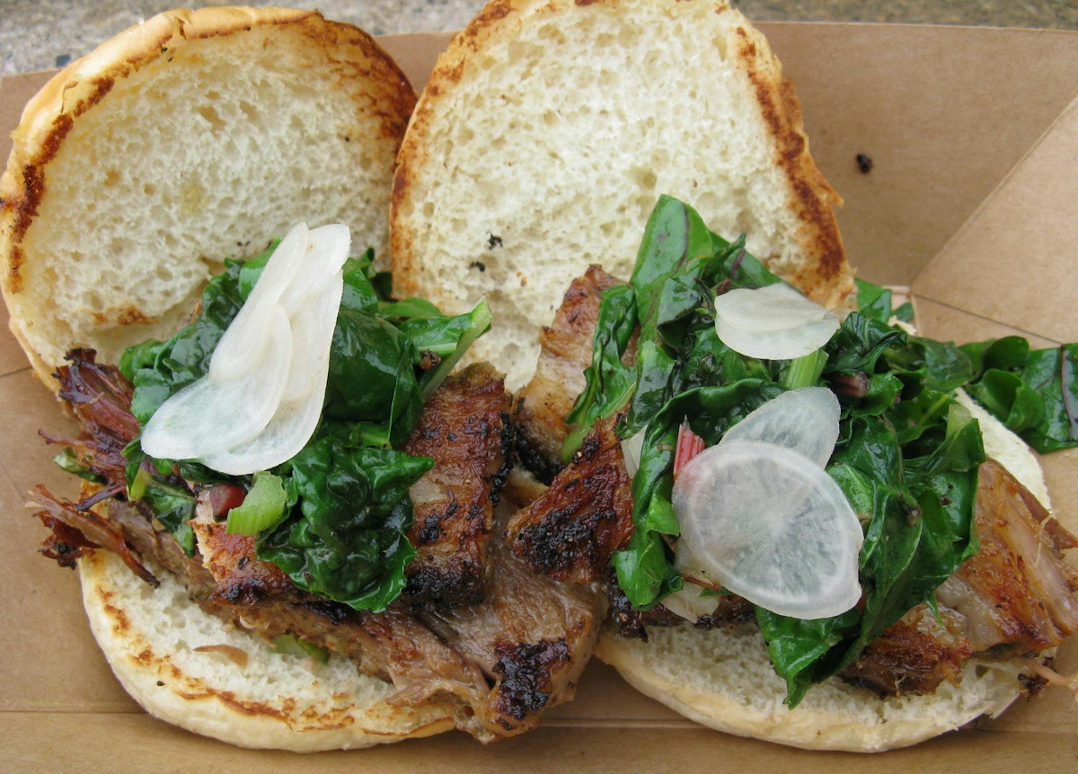 Photo by RICK NELSON Pork belly sliders from Gastrotruck